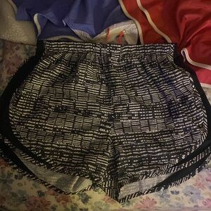 Nike and under armor running shorts size medium